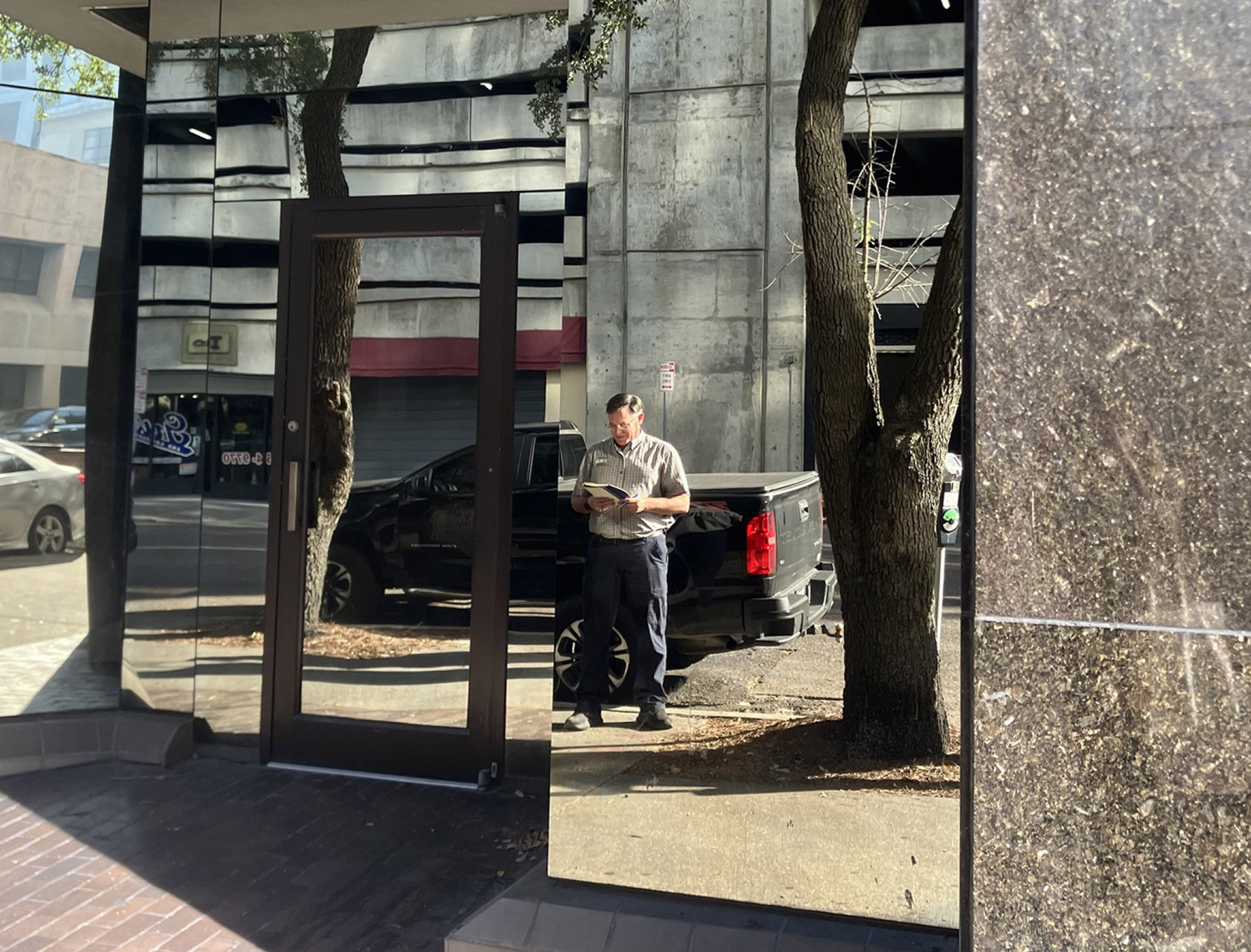 LONF Co-Lead Mike Taylor reflected in COJ building